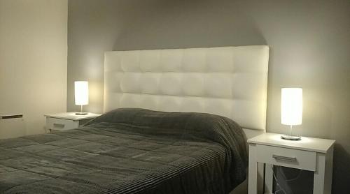 Voodi või voodid majutusasutuse Nueva Córdoba Rondeau toas