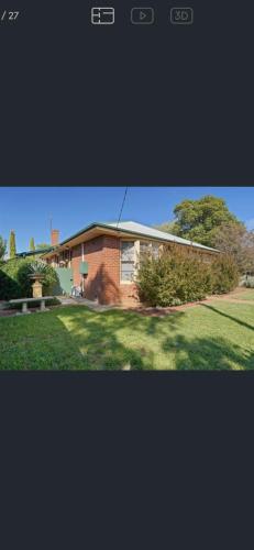 a picture of a house with a yard at Tamworth suite - Your Boutique Retreat in Dubbo in Dubbo