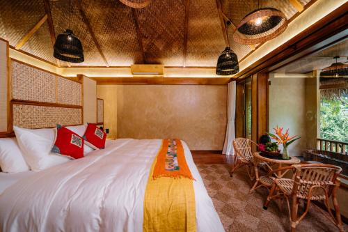 An Châng Retreat & Spaにあるベッド