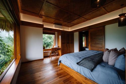An Châng Retreat & Spaにあるベッド