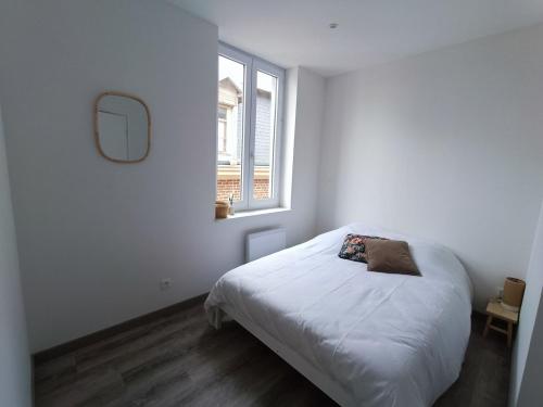 เตียงในห้องที่ L'Annexe des Dunes