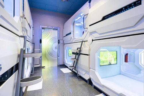 an inside view of an rv with a hallway at Capsule Riverside in Ho Chi Minh City