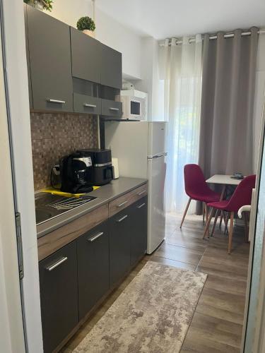 Køkken eller tekøkken på Soft Apartments
