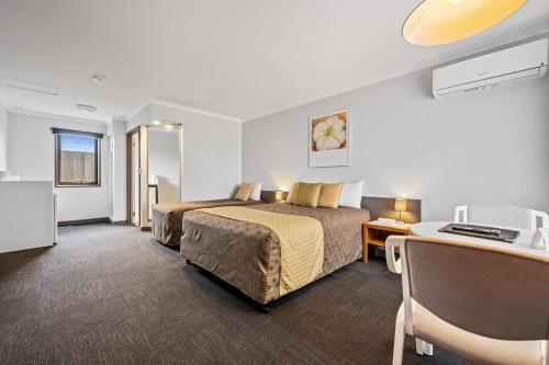 Postel nebo postele na pokoji v ubytování Comfort Inn The Pier