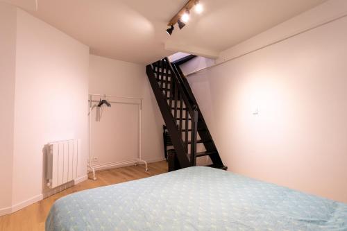 Llit o llits en una habitació de Le Zen