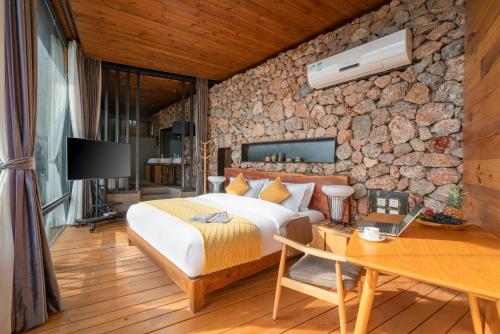 TV a/nebo společenská místnost v ubytování Manwu Dali Jimu Boutique Guesthouse