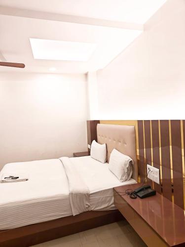 Hotel Apple Villa - New Delhiにあるベッド