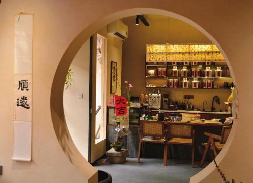 Restaurant ou autre lieu de restauration dans l'établissement 寺外茶宿SiWai tea&house-Near Xi' an Bell Tower