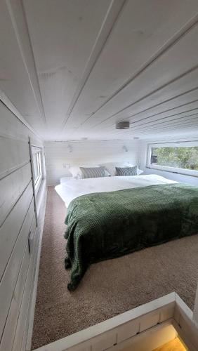 Postel nebo postele na pokoji v ubytování Staymoovers - Tinyhouse Zator