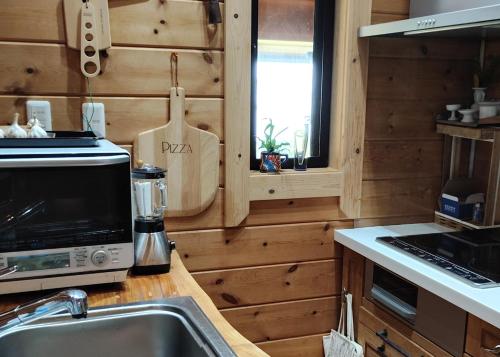 Dapur atau dapur kecil di ログコテージたらまんじゃく
