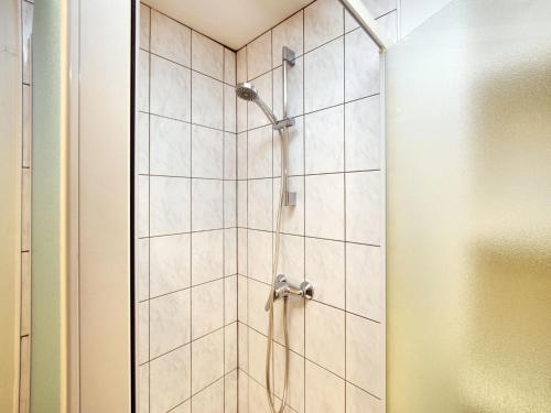 a shower in a bathroom with a glass door at Holiday Home in Rendeux with Terrace in Rendeux