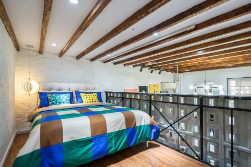 Una cama o camas en una habitación de Xizhi B&B & Luxury Courtyard