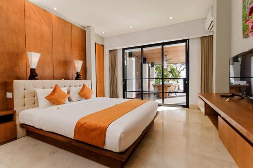 Postel nebo postele na pokoji v ubytování Villa By The Sea with private swimming pool in Benoa - Nusa Dua