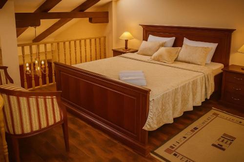 Postel nebo postele na pokoji v ubytování Hotel Tivoli