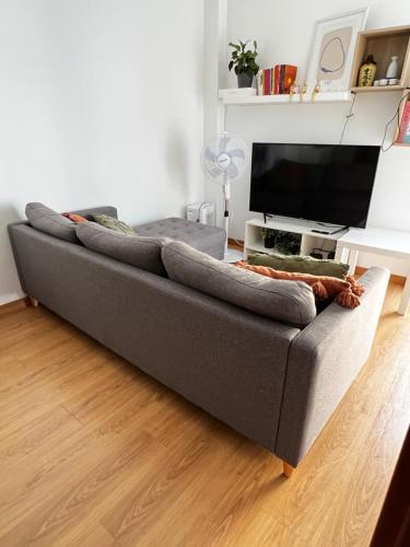 TV a/nebo společenská místnost v ubytování OMG Faro