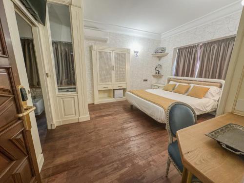 Postel nebo postele na pokoji v ubytování Arunda Luxury Boutique Hotel