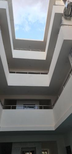a skylight in the ceiling of a room at Nayuha Beach New Penthouse B3 in Flic-en-Flac