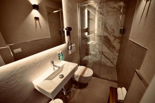 Ванная комната в Exclusive Rooms at Boutique Arte