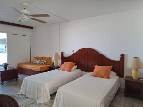 Llit o llits en una habitació de Le paradis c'est ici