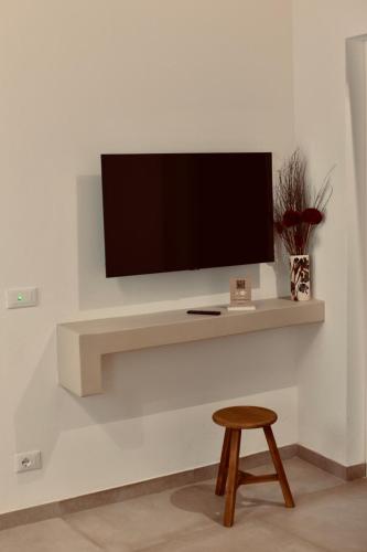 Телевизор и/или развлекательный центр в Exclusive Rooms at Boutique Arte