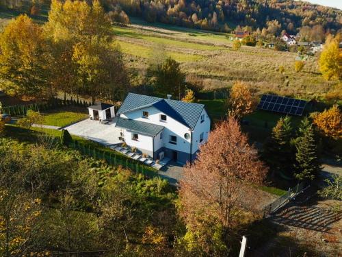 an aerial view of a house in a field at Dablin 9 in Korbielów
