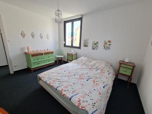 Ένα ή περισσότερα κρεβάτια σε δωμάτιο στο L'Atelier de l'Apothicaire