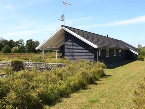 Taman di luar 14 person holiday home in Rødby-By Traum