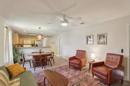 a living room with a couch and a table at Relaxing Pace Bay House home in Pace
