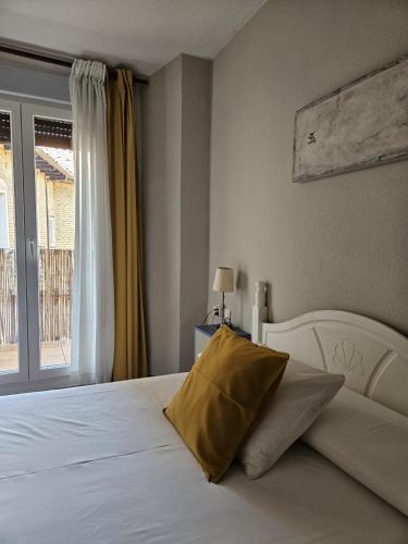 Katil atau katil-katil dalam bilik di Hostal San Martin