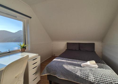 Postel nebo postele na pokoji v ubytování Bluewater Cottage - Blåvannshytta