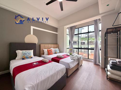 a hotel room with two beds and a window at Costa Mahkota - 1min I Mahkota Parade Mall I Dataran Pahlawan I Mahkota Hospital in Melaka