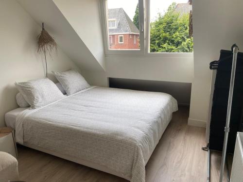 Katil atau katil-katil dalam bilik di Appartement Buissant des Amorie!