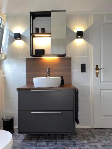a bathroom with a sink and a toilet at Apartment in Marburg in Marburg an der Lahn