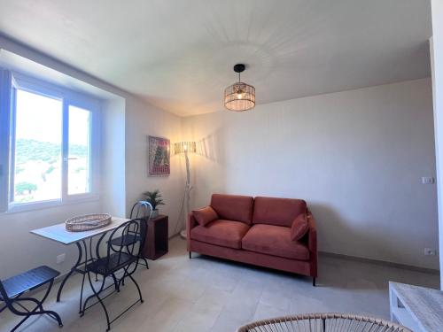 Χώρος καθιστικού στο 55m2 de charme - Vue exceptionnelle églises & mer