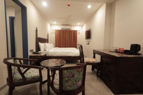 Ένα ή περισσότερα κρεβάτια σε δωμάτιο στο Hotel Nirvana boutique