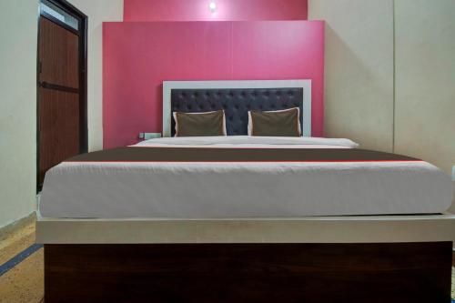 Hotel O The Legent Hotelにあるベッド