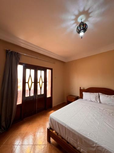 Una cama o camas en una habitación de Hotel Ourida Zagora