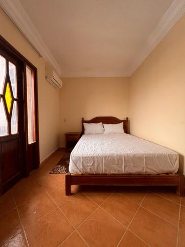 Una cama o camas en una habitación de Hotel Ourida Zagora