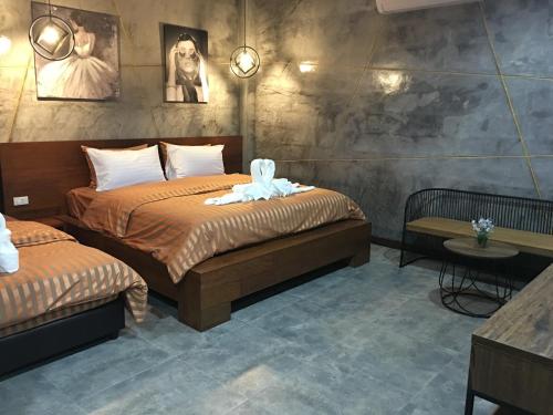 Postel nebo postele na pokoji v ubytování Le Park 23 Boutique Resort