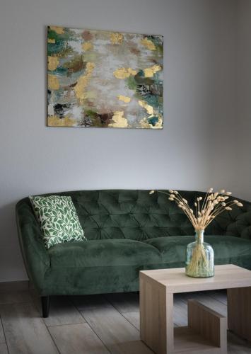 Гостиная зона в GLEUEL INN - digital hotel & serviced apartments & boardinghouse mit voll ausgestatteten Küchen