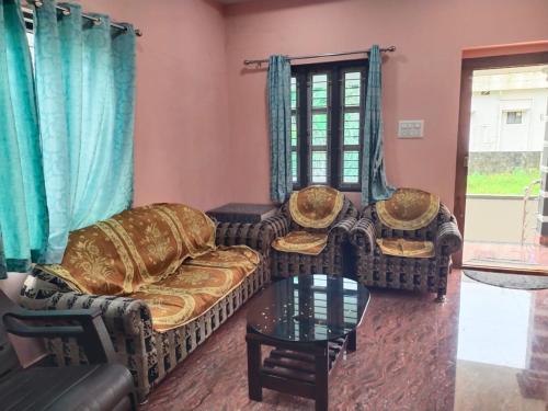 Χώρος καθιστικού στο Athithi Home Stay