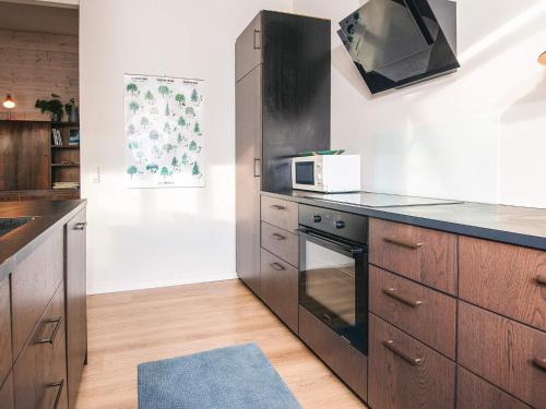 Η κουζίνα ή μικρή κουζίνα στο 5 person holiday home in Ans By-By Traum