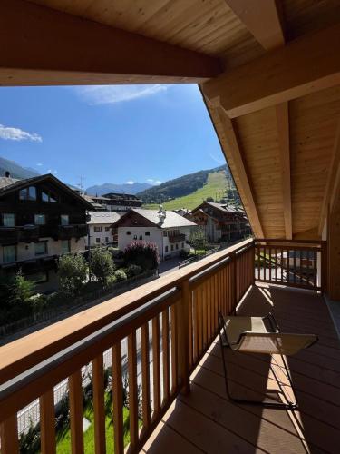 a view from the balcony of a house at Baita PierIta Stua Genziana e Ginepro in Bormio