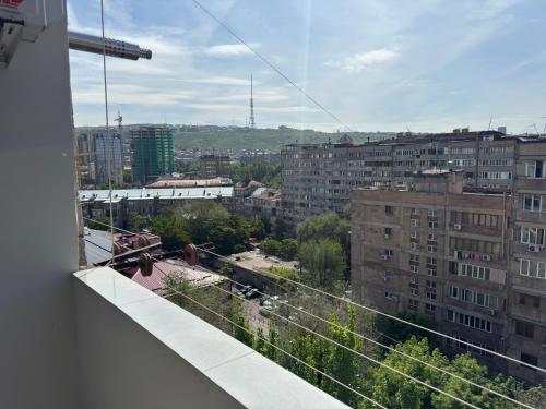 a view of a city from a balcony at New apartment in centre Yerevan in Yerevan
