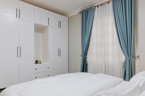 Postel nebo postele na pokoji v ubytování Facile Residences