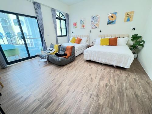 Una cama o camas en una habitación de Manman Homestay