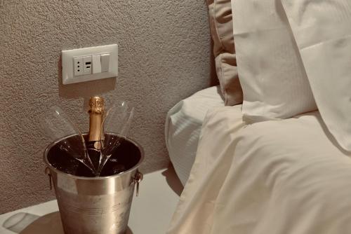 Кровать или кровати в номере Exclusive Rooms at Boutique Arte