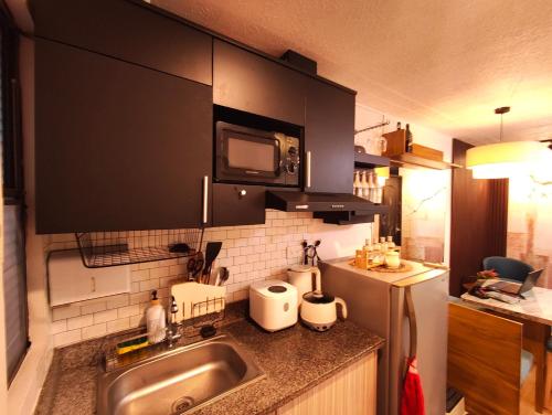 Η κουζίνα ή μικρή κουζίνα στο Condo Stay near Philippine Arena - Chiara's Stay Inn