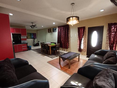 Χώρος καθιστικού στο Janaida Homestay Alor Setar