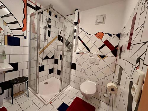 a bathroom with a shower and a toilet at Apart Annelies in Kauns